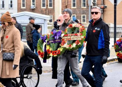 Cllr. Adam Cooper supporting veterans on remembrance day.
